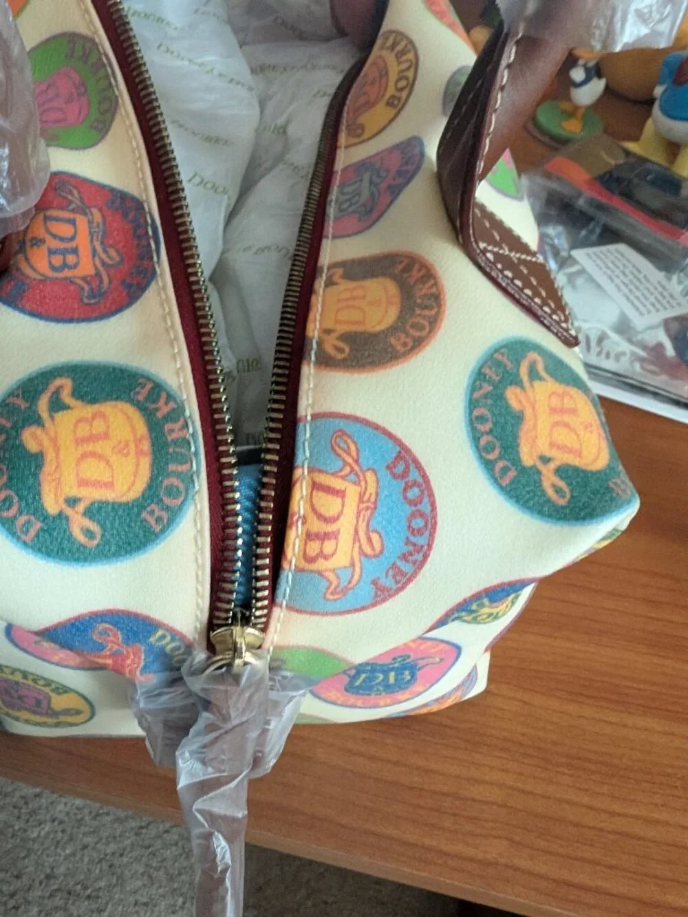 NWT Dooney & Bourke Vintage Medallion Stamp Satchel Bag Multi Color Logo